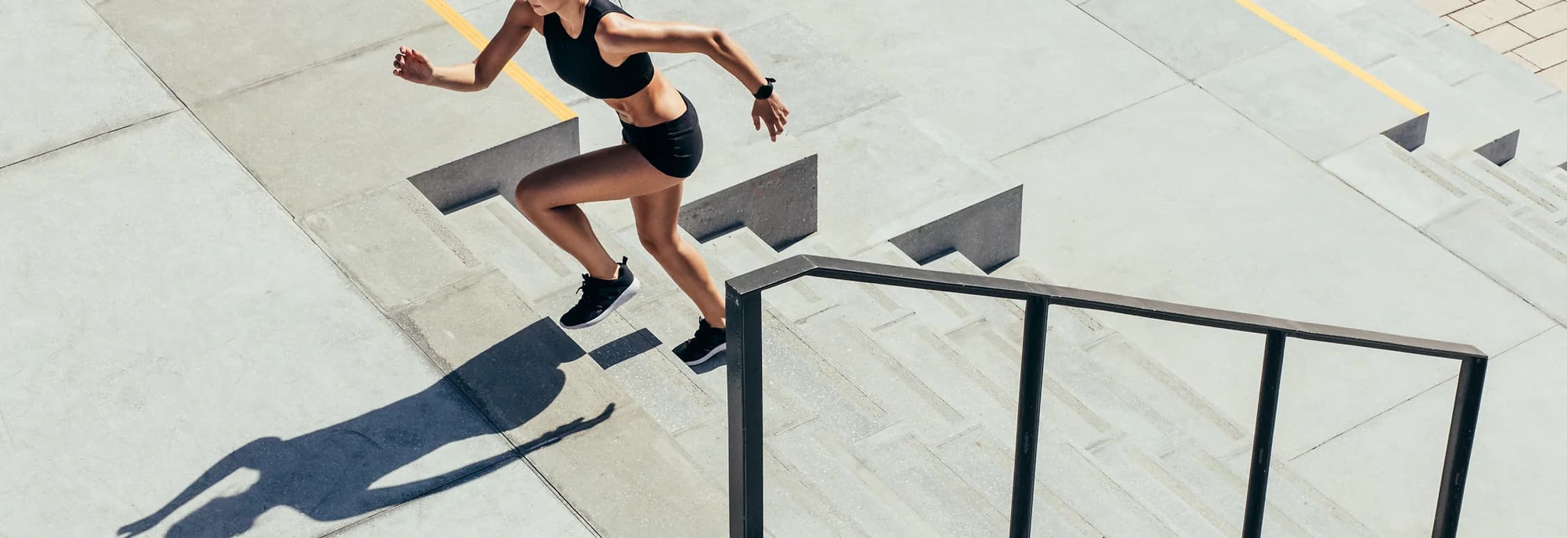 woman running up stairs